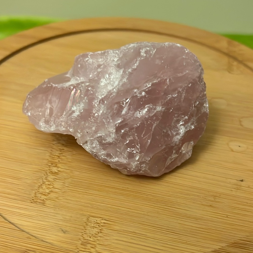 Rose quartz crystal. With rainbows